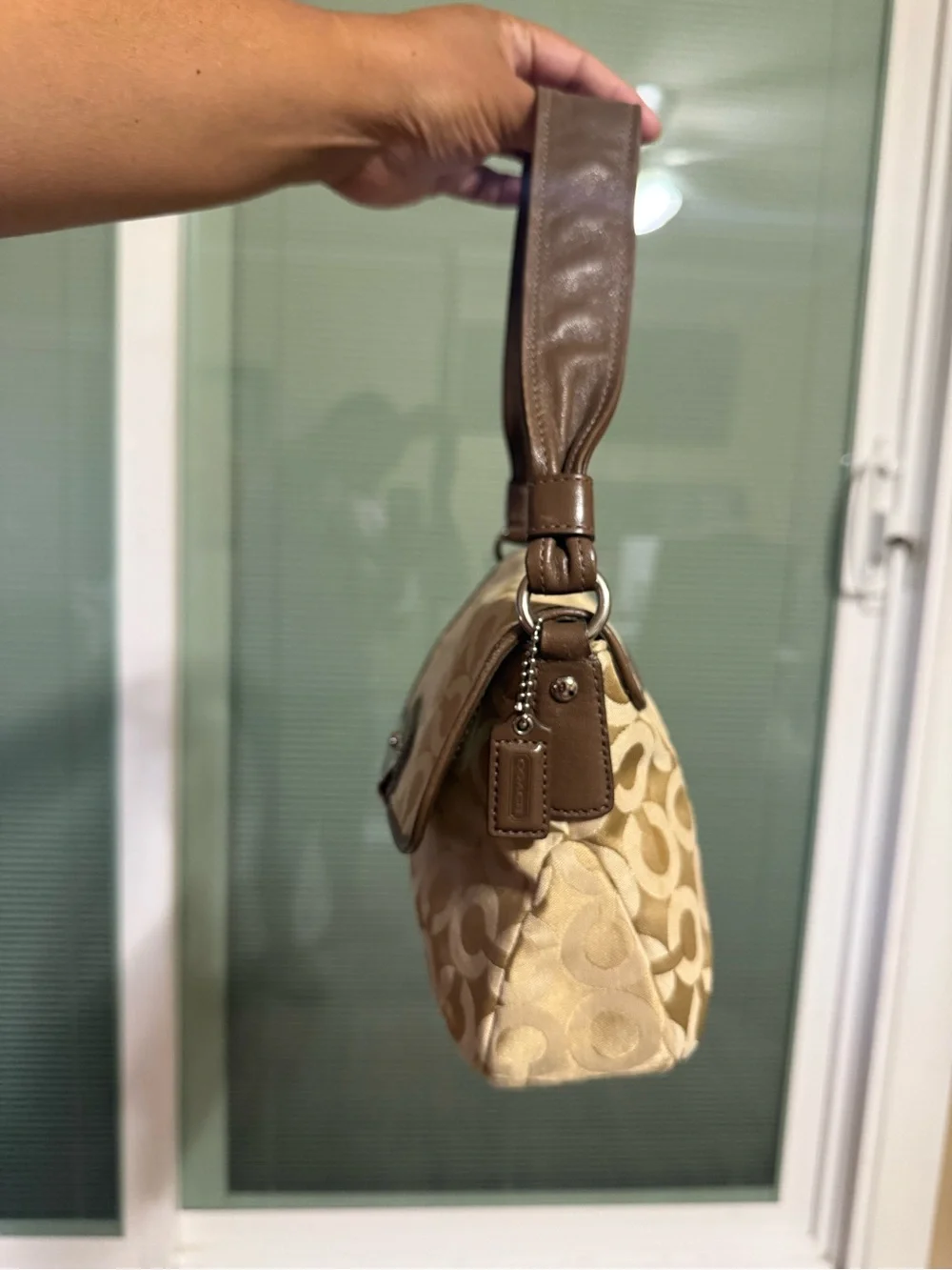 Coach elegant beige
